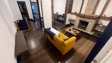 Habitación con 1 cama doble o 2 individuales | Zona de estar