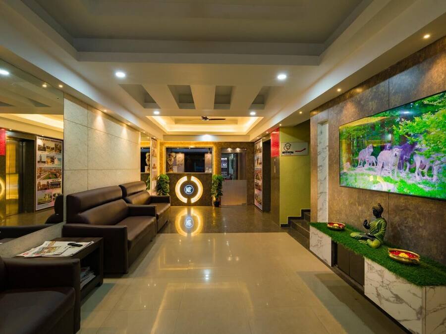 Quarto casal standard | Área de estar