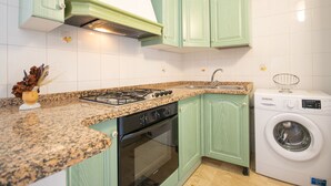Fridge, oven, stovetop, cookware/dishes/utensils - Capo Comino 1 - Two Bedroom Apartment, Sleeps 5 (La Caletta)