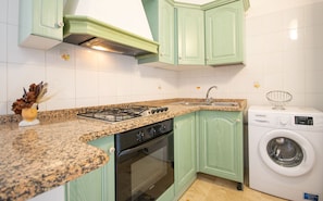 Fridge, oven, stovetop, cookware/dishes/utensils - Capo Comino 1 - Two Bedroom Apartment, Sleeps 5 (La Caletta)