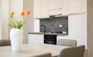 Fridge, oven, stovetop, cookware/dishes/utensils - Capo Comino 3 - Two Bedroom Apartment, Sleeps 6 (La Caletta)