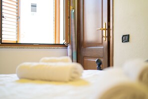 Iron/ironing board, bed sheets - La Caletta 1 - One Bedroom Apartment, Sleeps 2 (La Caletta)