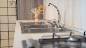 Fridge, oven, stovetop, cookware/dishes/utensils - Mandras 1 - One Bedroom Apartment, Sleeps 4 (La Caletta)