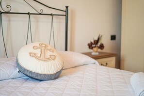 Iron/ironing board, bed sheets - La Caletta 3 - One Bedroom Apartment, Sleeps 2 (La Caletta)
