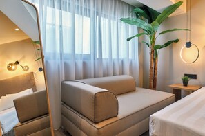 Superior Room | Living area | 50-inch Smart TV with digital channels