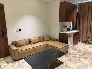 Chambre exclusive, vue sur la cour intérieure | Aire de séjour