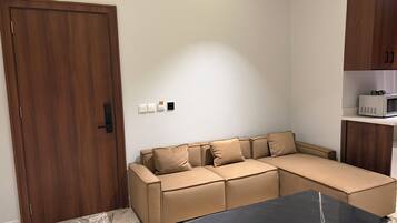 Exclusive Room, Courtyard View | Living area