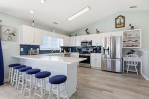 Fridge, microwave, oven, stovetop - Barefoot Pelican| Pool, Bikes & Game Room (Emerald Isle)