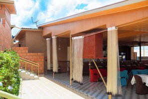 Outdoor dining - Bird of paradise motel (Kigali)