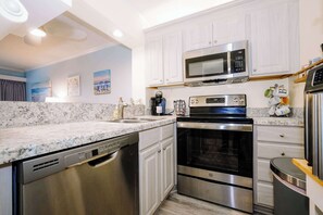 Fridge, microwave, oven, stovetop - Ocean Creek Resort Condo-Adjustable King Bed, Pools, Beach Club+Tram (Myrtle Beach)
