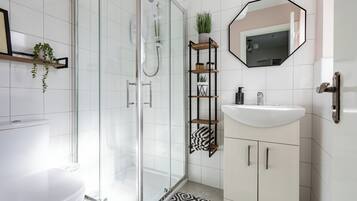 Hair dryer, towels, soap, shampoo