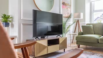 Luxury House | Living area | 52-inch Smart TV with digital channels, Netflix, streaming services