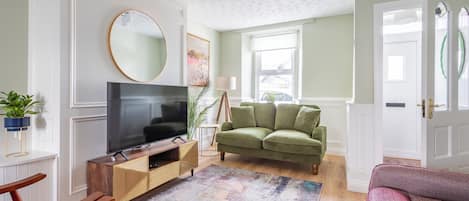 Luxury House | Living area | 52-inch Smart TV with digital channels, Netflix, streaming services