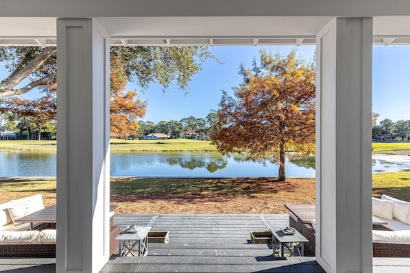 Step onto your private covered patio and soak in breathtaking lake views framed by golden autumn trees. - Stunning Pet Friendly Home Ravens Run (Miramar Beach)