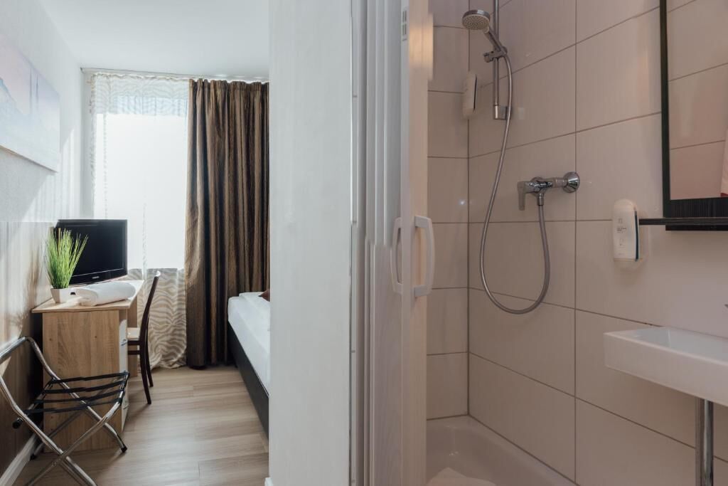 Standard Single Room | Bathroom | Shower, hair dryer, towels, soap