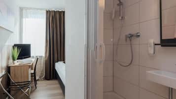Standard Single Room | Bathroom | Shower, hair dryer, towels, soap