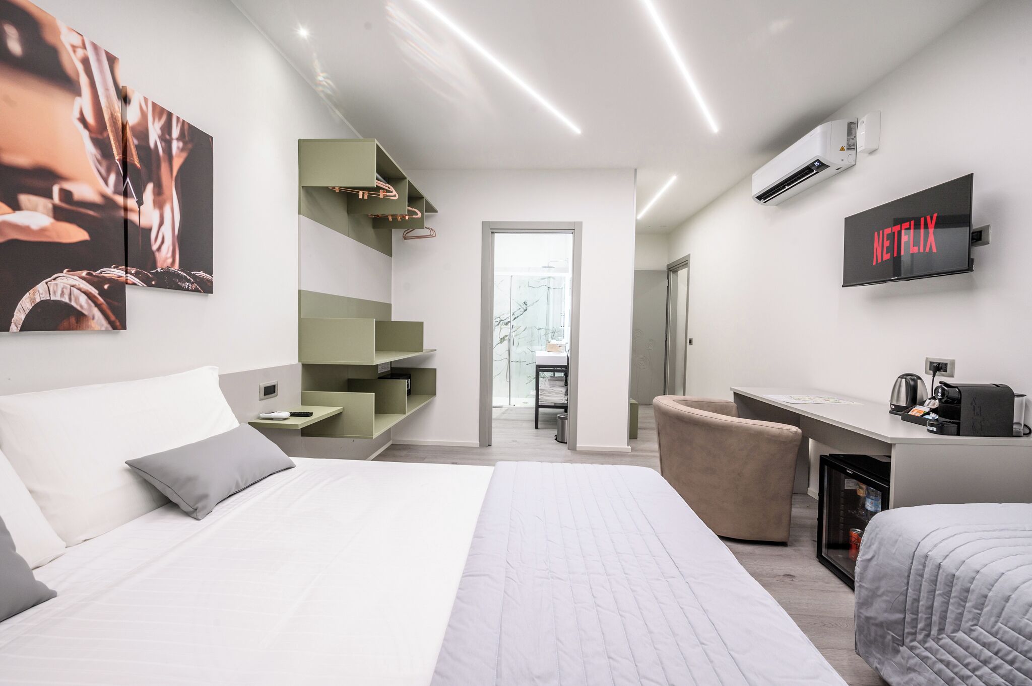 Family Triple Room, Balcony, Courtyard View | Frette Italian sheets, premium bedding, free minibar, in-room safe