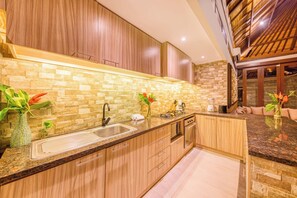 Fridge, microwave, oven, stovetop - Villa Jalamati - 3 BDR Luxury Escape, Prime Area (Kerobokan Kelod, Kec. Kuta Utara, Kabupaten Badung)