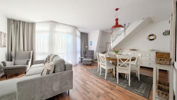 Appartement (52) | Woonruimte | Een flatscreentelevisie