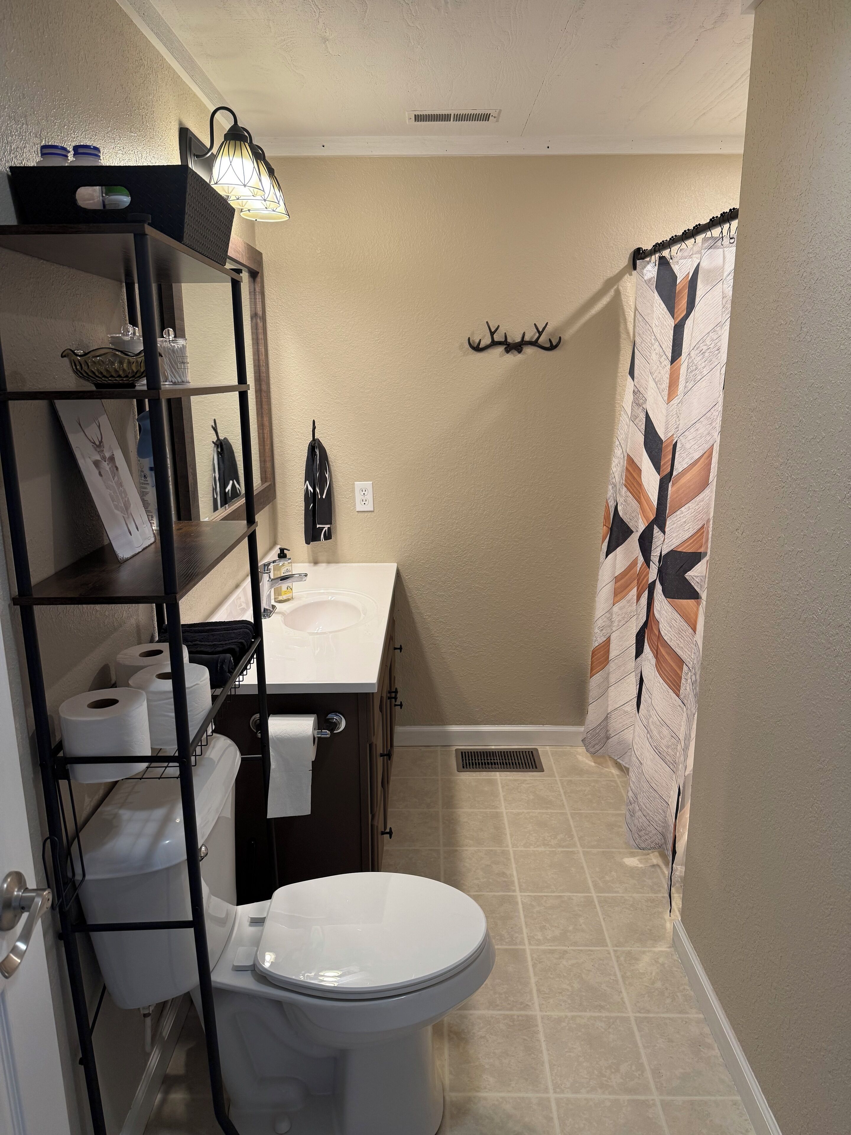 Shower, towels, soap, toilet paper