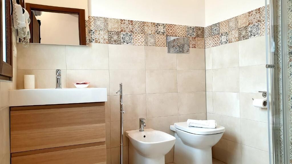 Chambre Double Deluxe, vue piscine | Salle de bain