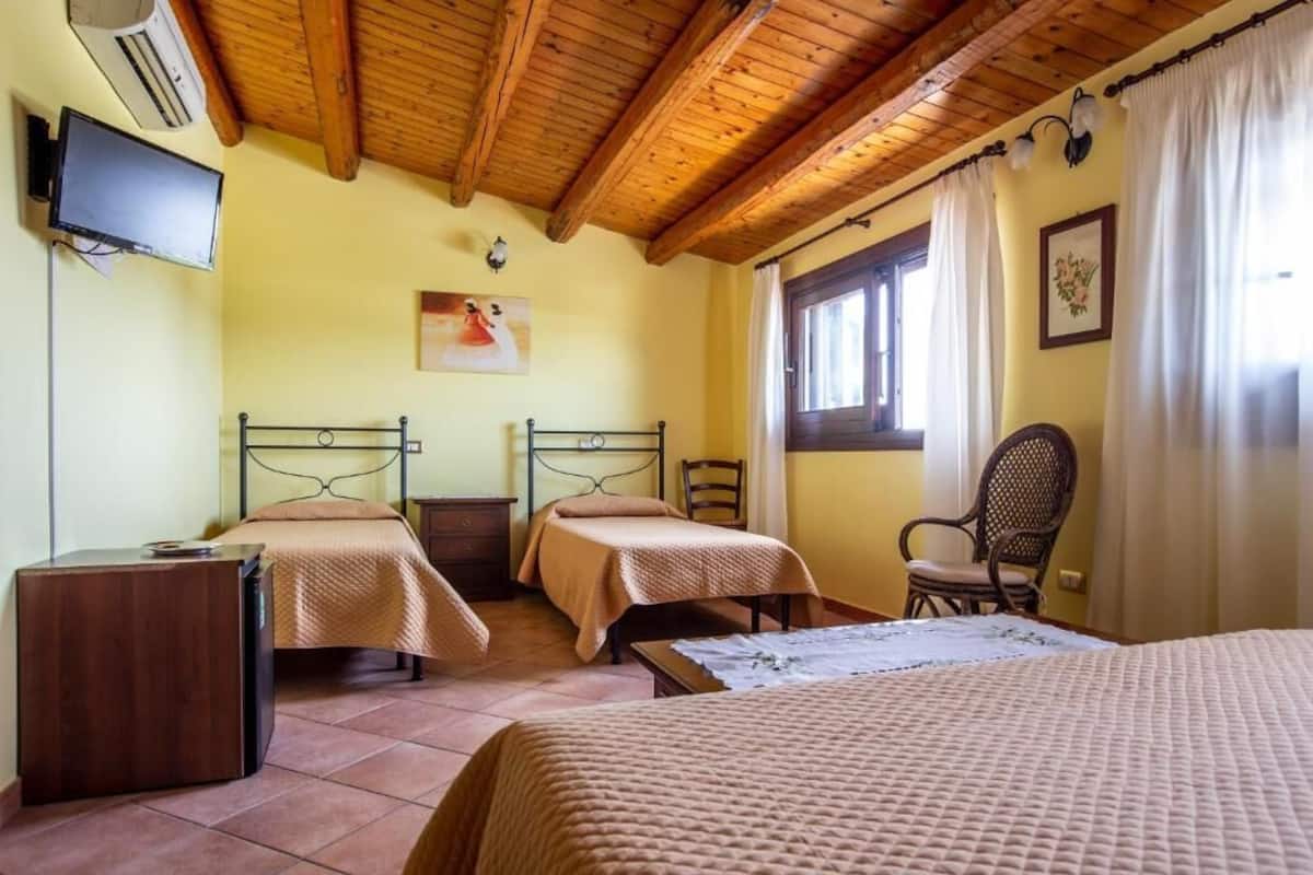 Classic Quadruple Room, Garden View | Free WiFi