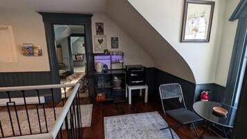 Habitación triple Deluxe, vista al mar | Interior