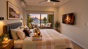 Una camera da letto con un letto, un comodino e vista sulla città attraverso una porta scorrevole.
