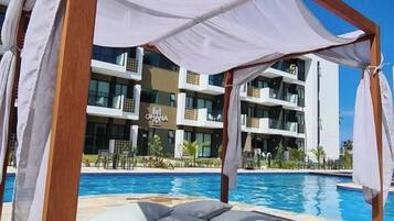 Apartment | Pool | 7 outdoor pools, open 6:30 AM to 10:30 PM, pool umbrellas, pool loungers