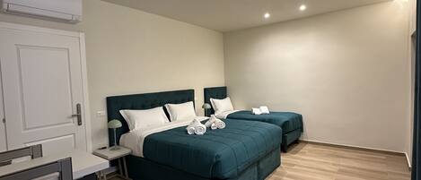 Comfort Triple Room, Non Smoking, Courtyard View | Desk, iron/ironing board, free WiFi
