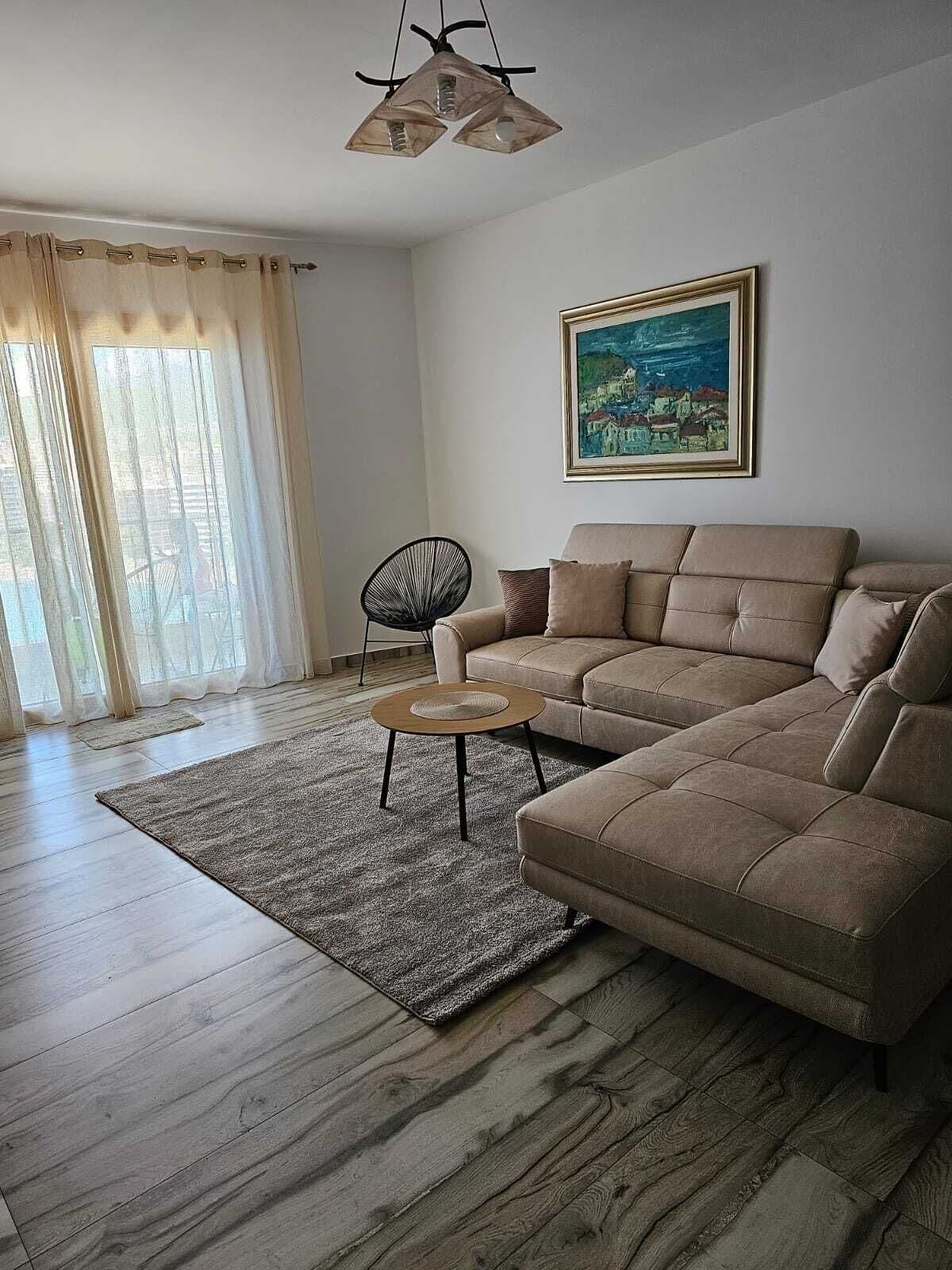 Departamento Deluxe, balcón, vista al mar | Área de sala de estar