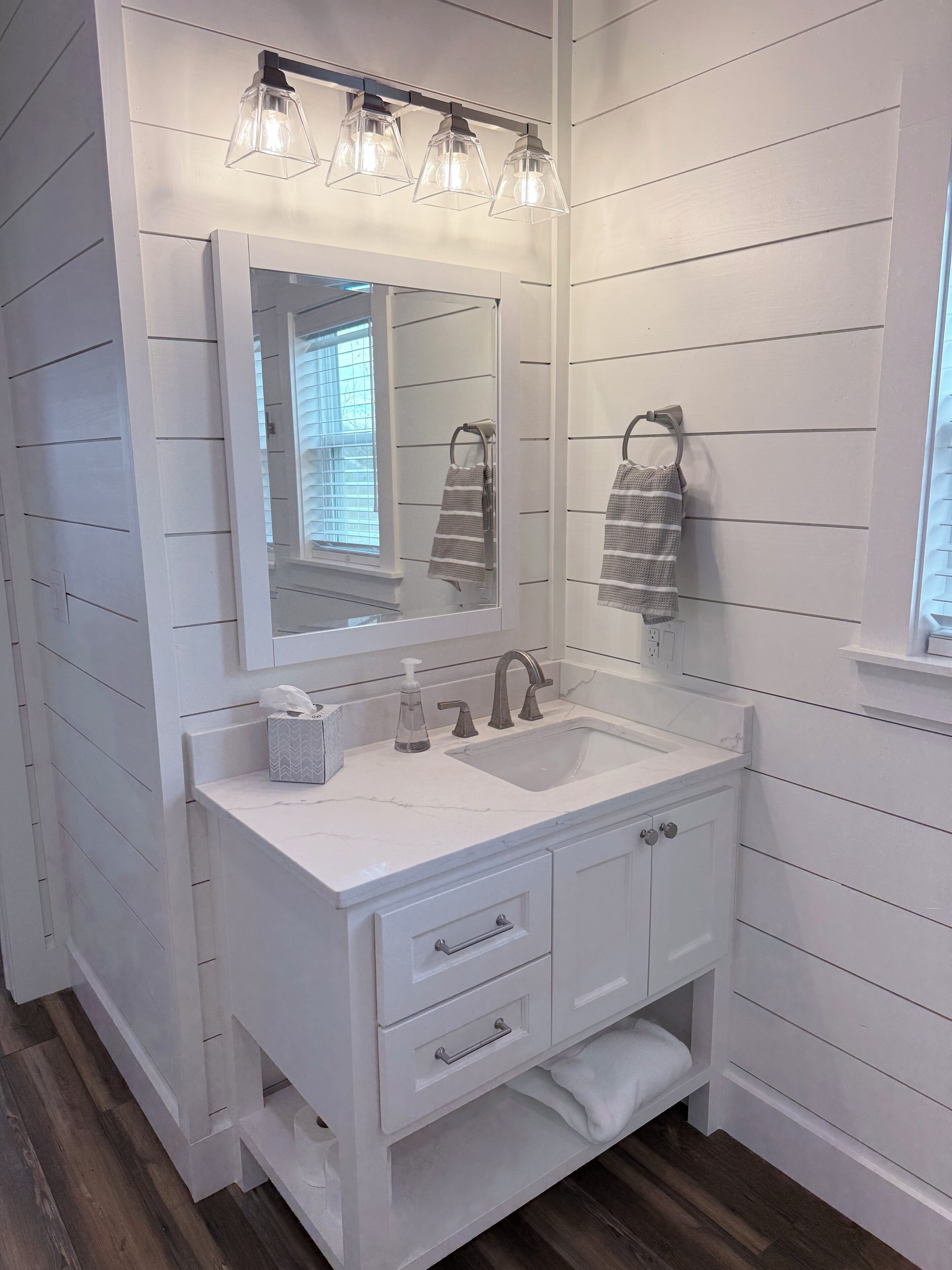 Shower, towels, soap, toilet paper