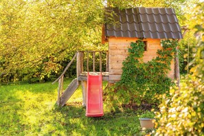 Children’s area - Wooden forest home with pool, fireplace and playground for kids (Gerovo Tounjsko)
