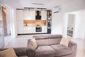 TV - Holiday home by the Korana River with private wellness and nature views. (Donji Velemerić)