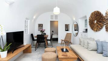 Cave Villa with Hot Tub & Caldera View | Living area