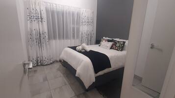 2 chambres, fer et planche Ă repasser, Wi-Fi, draps fournis