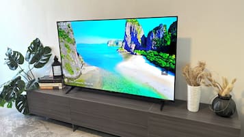 Superior Apartment, Balcony | Living area | 50-inch flat-screen TV with cable channels