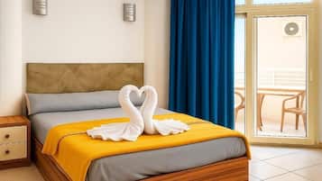 Luxury Studio, Balcony, Beach View | Desk, laptop workspace, WiFi