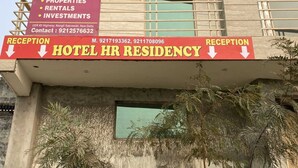 A hotel sign with "Bharat Associates" and "Hotel HR Residency" indicating the name and type of establishment. - Hotel HR Residency (New Delhi)