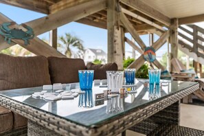 Outdoor dining - Dolphin Delight 𓇼 Ocean Views + Beach Walkable (Oak Island)