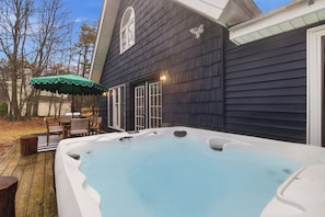 Terrace/patio - NEW Cozy & Redesigned Chalet with Hot Tub, Fire Pit, Game Room, Heating/Cooling! (Long Pond)