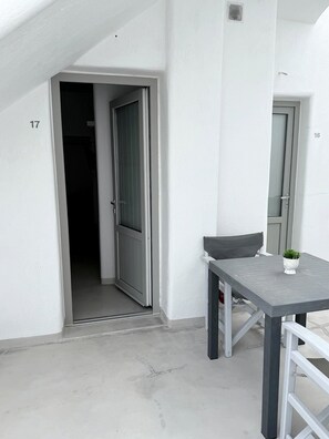 Habitación triple superior | Terraza o patio