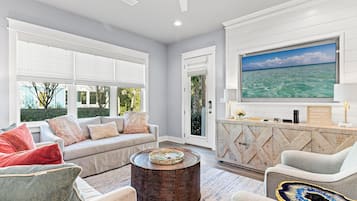 House | Living area | 65-inch Smart TV with digital channels, Netflix, Hulu