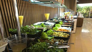 A buffet with various food options, including salads, vegetables, and other dishes. - Pera Aura Resort Hotel & Spa - All Inclusive (Kemer)