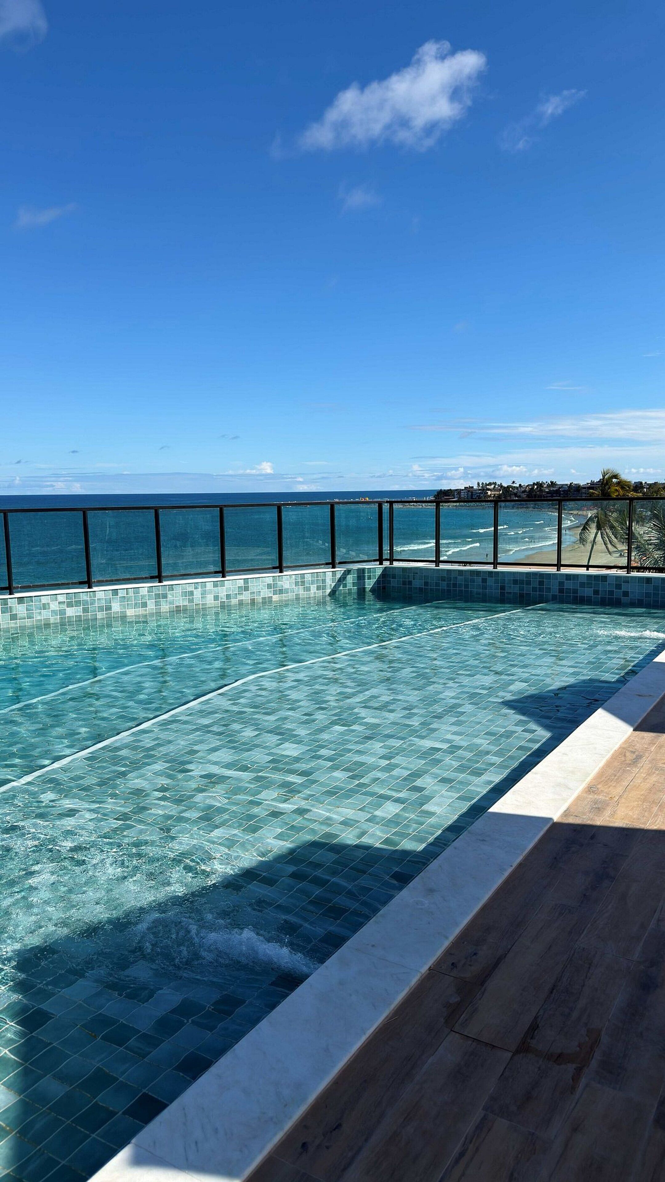 Outdoor pool, open 8:00 AM to 10:00 PM, pool umbrellas, sun loungers