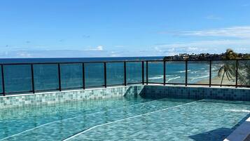 Outdoor pool, open 8:00 AM to 10:00 PM, pool umbrellas, sun loungers