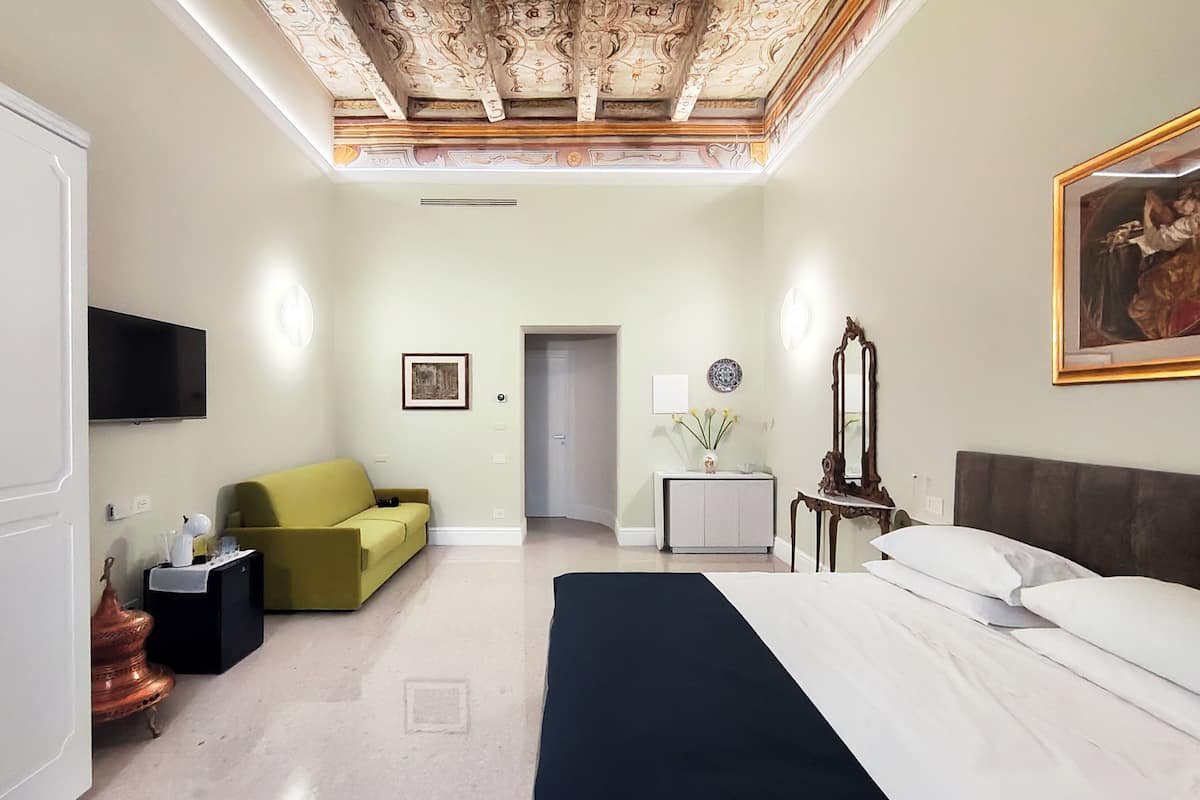 Luxury Suite, Balcony, City View | Desk, free WiFi, individually furnished, bed sheets