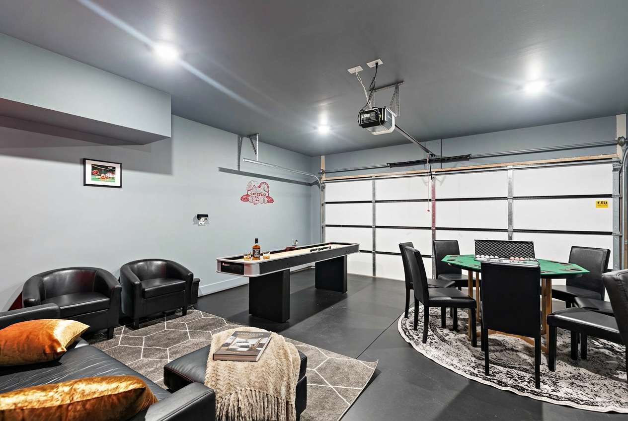 A modern indoor space with a pool table, comfortable seating, and a billiards table.
