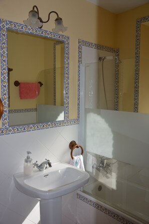Bidet, towels, soap, toilet paper