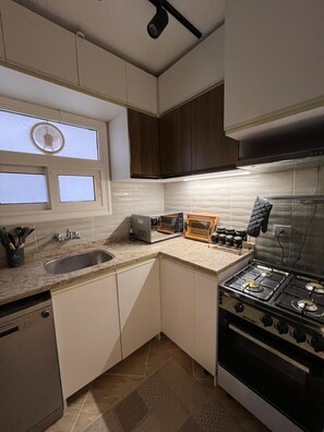 Superior Apartment, Multiple Beds, Air conditioning, Garden View | Private kitchen - Cozy Retreat in Madinty & Work-Station (New Cairo)